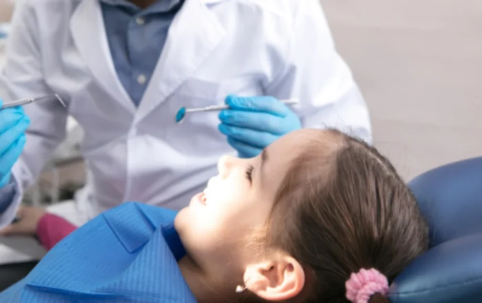 Child receiving an early airway orthodontics evaluation at a dental office