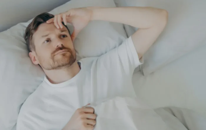 Man experiencing poor sleep linked to airway health and dental problems