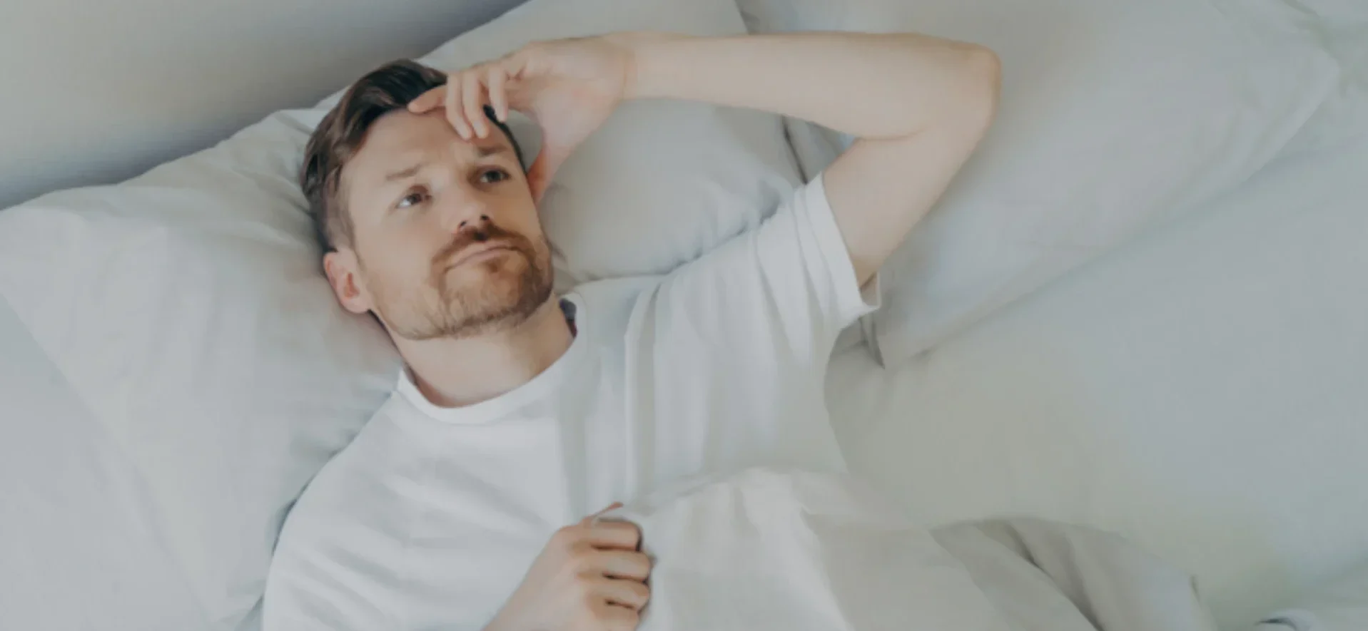 Man experiencing poor sleep linked to airway health and dental problems